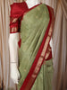 Pistachio Green Paisley Butta Zari Woven Design Pure Kanchipuram Silk Saree with Contrast Double Zari Border