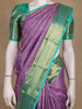 Purple Floral Woven Kanchipuram Silk Saree With Contrast Teal Green Zari Border