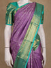 Purple Floral Woven Kanchipuram Silk Saree With Contrast Teal Green Zari Border