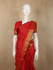 Radiant Vermilion Red Butta Zari Woven Design Pure Kanchipuram Silk Saree with Zari Border
