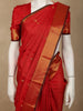 Radiant Vermilion Red Butta Zari Woven Design Pure Kanchipuram Silk Saree with Zari Border