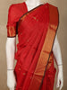 Radiant Vermilion Red Butta Zari Woven Design Pure Kanchipuram Silk Saree with Zari Border