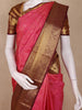 Rani Pink Floral Woven Design Pure Kanchipuram Silk Saree with Contrast Brown Zari Border