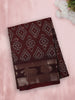 Rich Deep Maroon Geometric Ikat-Inspired Design Crepe Saree with Ornamental Zari Woven Border