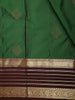 Rich Emerald Green Butta Zari Woven Design Pure Kanchipuram Silk Saree with Contrast Striped Border