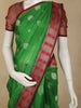 Rich Emerald Green Floral Butta Woven Design Tissue Silk Fancy Saree with Contrast Border