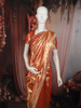 Rich Vermilion Red Floral Zari Woven Design Tissue Banarasi Saree with Scalloped Border