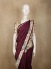 Rich Wine Maroon Solid Design Semi Tussar Saree with Contrast Floral and Peacock Motif Border