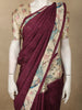 Rich Wine Maroon Solid Design Semi Tussar Saree with Contrast Floral and Peacock Motif Border