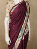 Rich Wine Maroon Solid Design Semi Tussar Saree with Contrast Floral and Peacock Motif Border