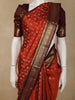 Rust Orange Butta Woven Design Pure Kanchipuram Silk Saree with Contrast Peacock Zari Border