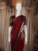 Rust Orange Butta Zari Woven Design Pure Kanchipuram Silk Saree with Contrast Purple Gold Border