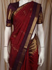 Rust Orange Butta Zari Woven Design Pure Kanchipuram Silk Saree with Contrast Purple Gold Border