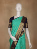 Sea Green Butta Woven Pure Kanchipuram Silk Saree With Navy Blue Zari Border