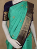 Sea Green Butta Woven Pure Kanchipuram Silk Saree With Navy Blue Zari Border