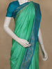 Sea Green Floral Butta Woven Soft Silk Saree with Contrast Teal Blue Zari Border