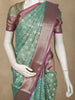 Sea Green Ikat Design Semi Banarasi Saree with Contrast Purple Zari Border