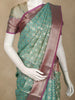Sea Green Ikat Design Semi Banarasi Saree with Contrast Purple Zari Border