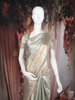 Silver and Gold Solid Design Tissue Silk Saree with Designer Border