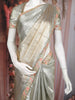 Silver and Gold Solid Design Tissue Silk Saree with Designer Border