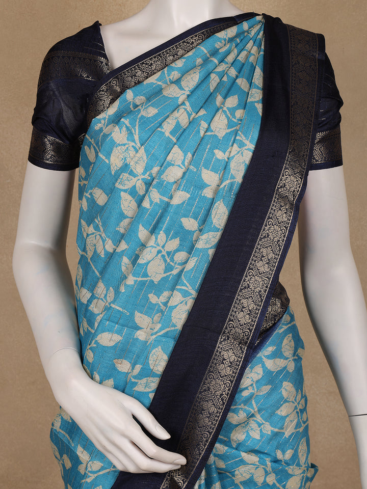 Sky Blue Floral Woven Tussar Silk Saree with Navy Border - Diadem