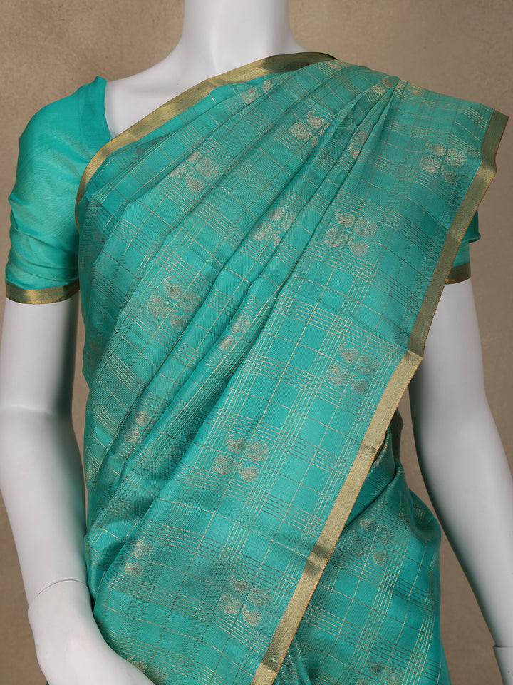 Sky Blue Peacock Butta and checks woven Silk Saree - Diadem