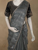 Smoky Charcoal Grey Striped Design Organza Designer Saree with Matching Blouse