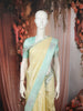 Soft Butter Yellow Checked Zari Woven Design Pure Kanchipuram Silk Saree with Contrast Floral Butta Border