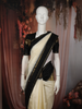 Soft Ivory White Woven Design Pure Kanchipuram Silk Saree with Contrast Temple Zari Border