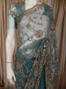 Steel Blue Floral Vine Sequins Embroidered Design Net Party Wear Saree with Designer Border