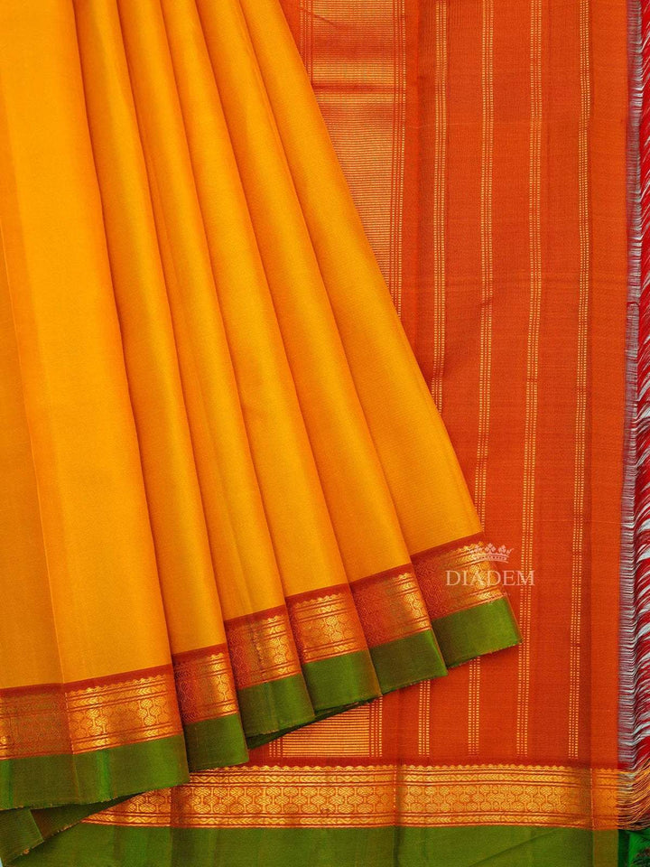 Mustard Yellow Pure Kanchipuram Pattu Saree with Plain body and Double color Zari Border - Diadem