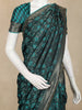 Teal Banarasi Saree with Floral Design And Designer Border