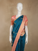 Teal Blue Floral Butta Woven Design Pure Kanchipuram Silk Saree with Contrast Floral Zari Border