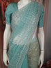 Teal Blue Heavy Sequins and Beads Embroidered Design Net Saree with Scalloped Border