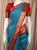 Teal Blue Vertical Striped Zari Woven Design Kanchipuram Silk Saree with Contrast Zari Border