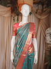 Teal Green Floral Woven Pure Kanchipuram Silk Saree with Zari Border