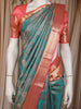 Teal Green Floral Woven Pure Kanchipuram Silk Saree with Zari Border