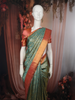 Teal Green Floral Zari Woven Design Pure Kanchipuram Silk Saree with Contrast Zari Border
