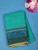 Teal Green Solid Cotton Saree With Blue Floral Design Border