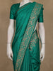 Teal Green Solid Design Raw Silk Saree with Zari Border