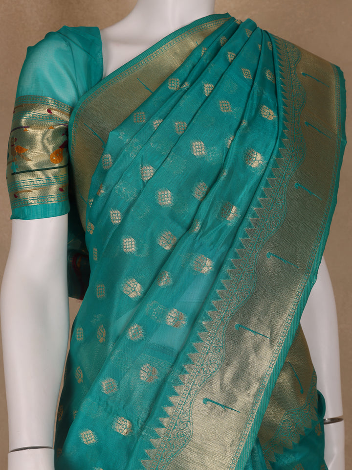 Teal Green Floral Motifs Zari Weaving Soft Silk Saree - Diadem