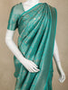 Turquoise Green Banarasi Saree with Floral Design And Designer Border
