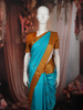 Turquoise Blue Butta Zari Woven Design Pure Kanchipuram Silk Saree with Contrast Zari Border