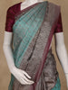 Turquoise Blue Floral Woven Pure Kanchipuram Silk Saree