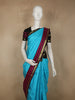 Turquoise Blue Solid Woven Design Pure Kanchipuram Silk Saree with Contrast Border