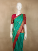 Turquoise Green Butta Zari Woven Design Pure Kanchipuram Silk Saree with Contrast Floral Zari Border