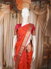 Vermilion Orange Floral Butta Zari Woven Design Pure Kanchipuram Silk Saree with Contrast Zari Border