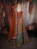 Vibrant Burnt Orange Floral and Birds Motif Sequins Embroidered Design Banarasi Silk Lehenga with Dupatta