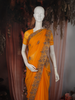 Vibrant Marigold Orange Floral Zari Embroidered and Stone Embellished Design Georgette Designer Saree