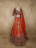 Vibrant Orange Floral Sequins and Beads Embroidered Design Banarasi Silk Bridal Lehenga with Designer Dupatta